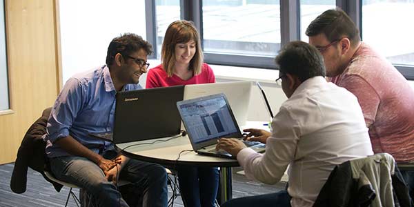 Postgraduate students studying